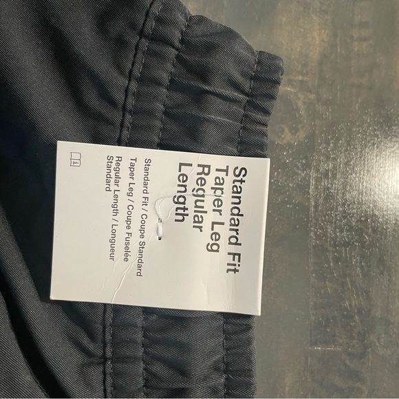 Nike Men's Sportswear Tech Essentials Unlined Commuter Pants - Picture 7 of 10